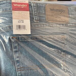 42W x 29L Wrangler Men's Light Blue Relaxed Fit Jeans